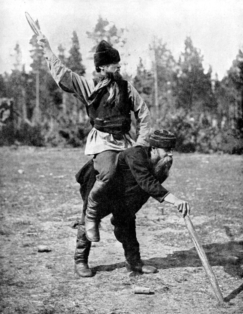 Suomalaiset pelaamassa Kykkaa, kansallispeliä, 1936 tekijältä ENA