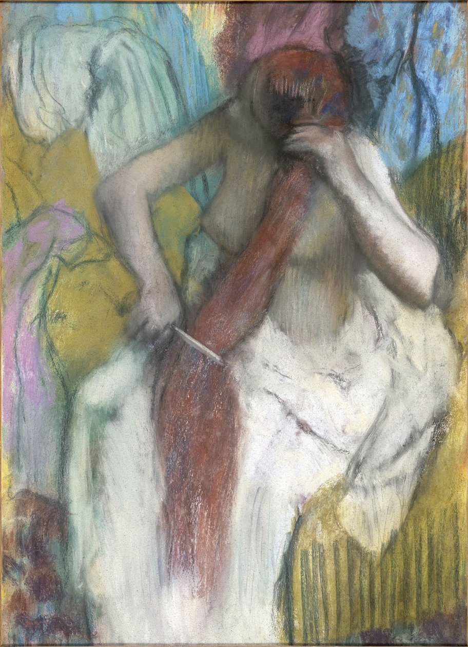 Nainen kampaa hiuksiaan tekijältä Edgar Degas