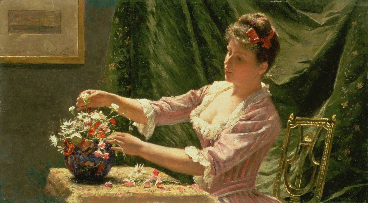 Nuori nainen asettelemassa kukkia tekijältä Emile Claus