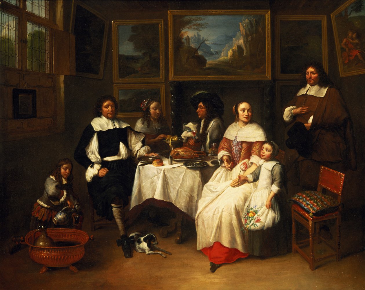 Flaamilainen perhe illallisella tekijältä Gillis van Tilborgh the younger