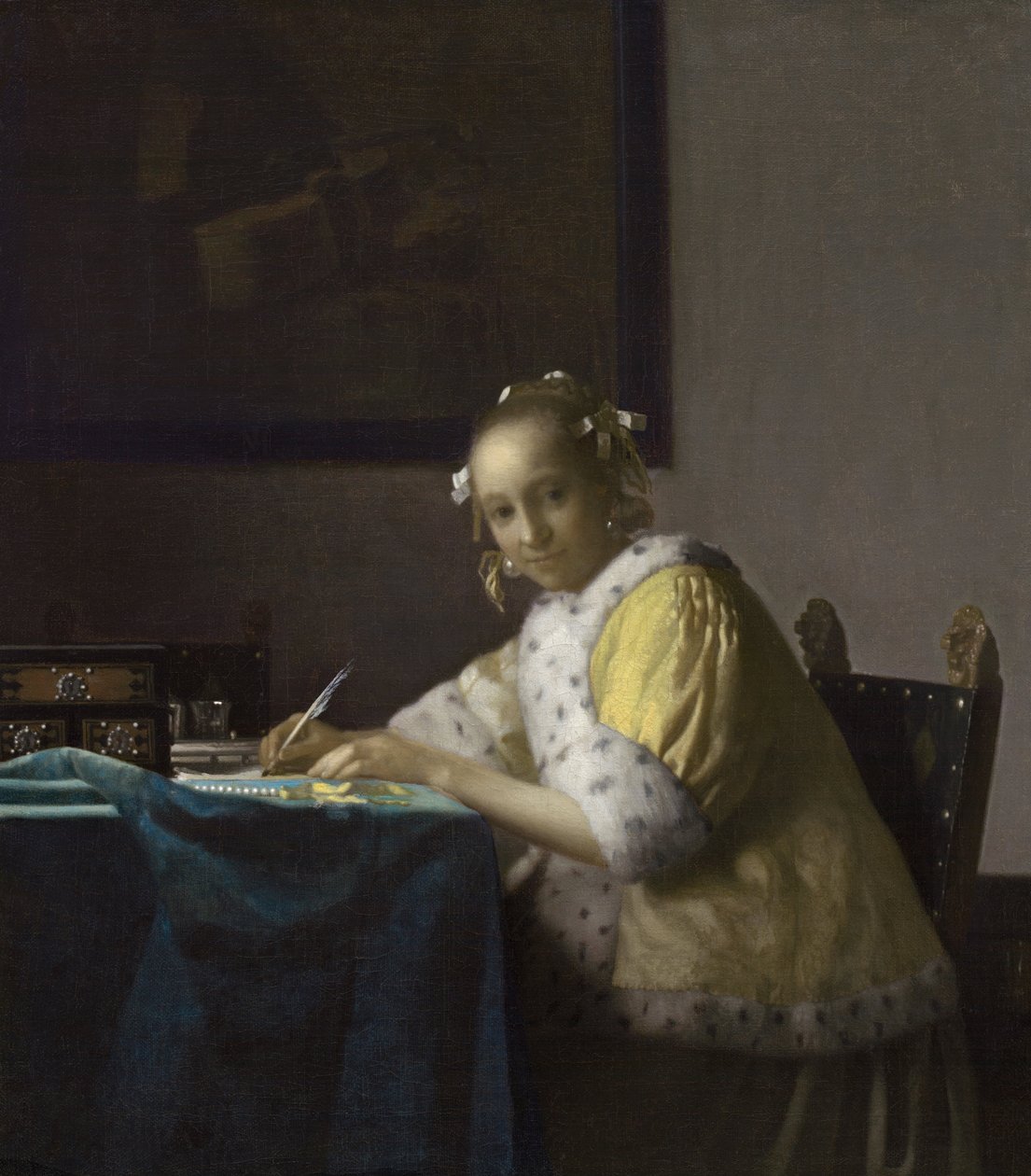Nainen kirjoittaa tekijältä Johannes Vermeer