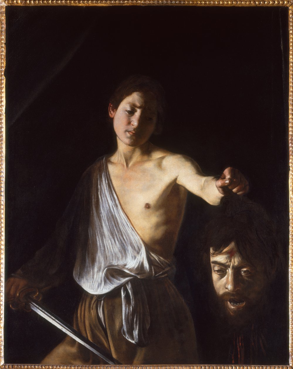 Daavid Goljatin pään kanssa, 1609-1610. tekijältä Michelangelo Caravaggio
