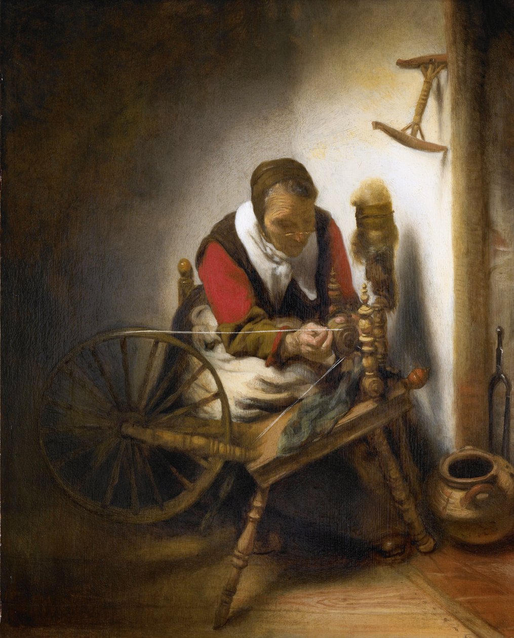Nainen pyörii. tekijältä Nicolaes Maes