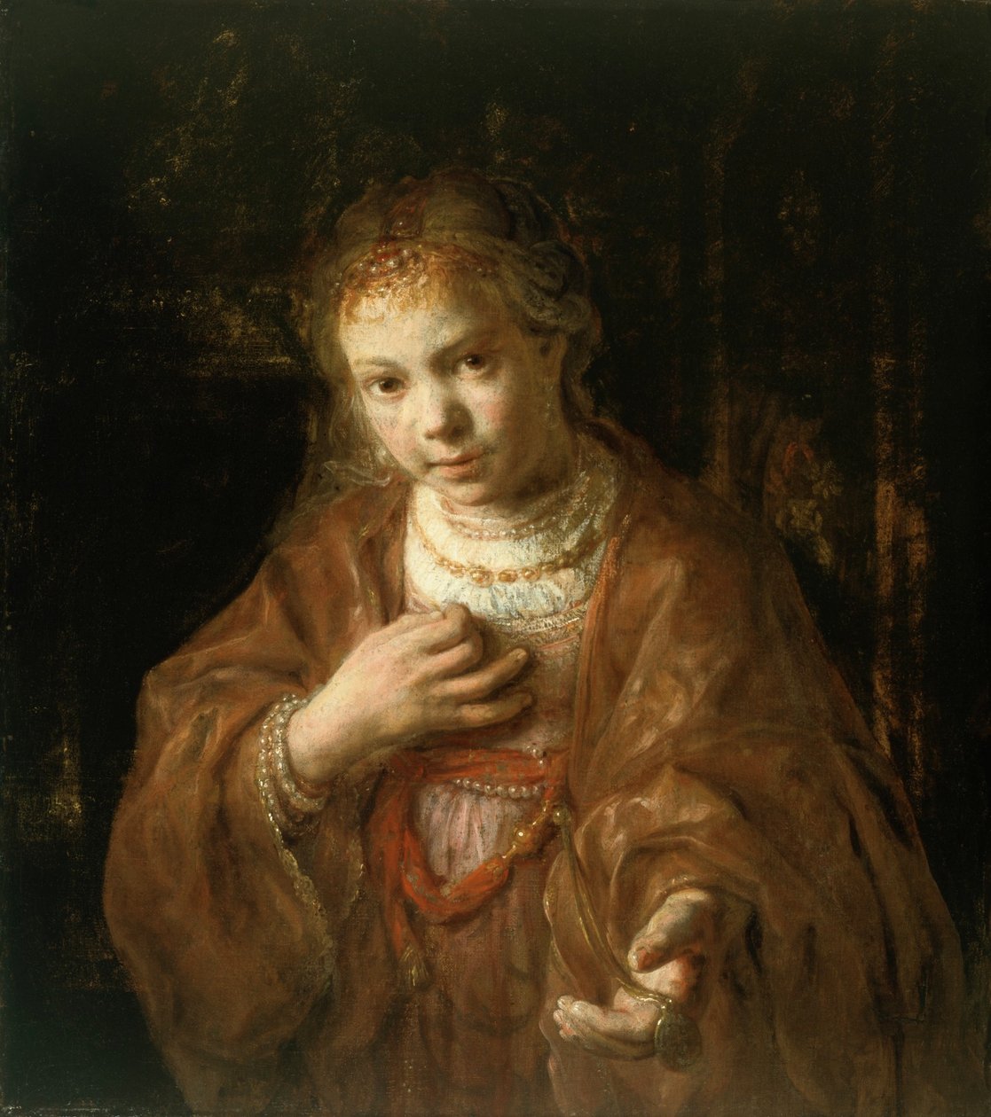 Nuori tyttö, jolla on mitali tekijältä Rembrandt