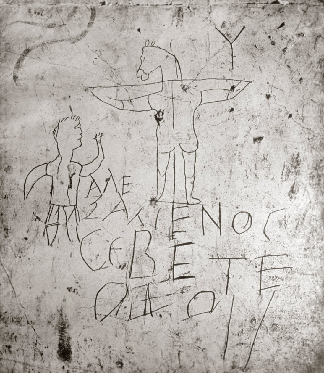 Jumalaa pilkkaava graffito ristiinnaulitsemisesta (kivi) tekijältä Roman