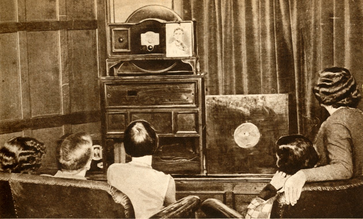 Ihmisiä katsomassa varhaista televisiolähetystä, vuodelta 1930, 1933. tekijältä Unbekannt