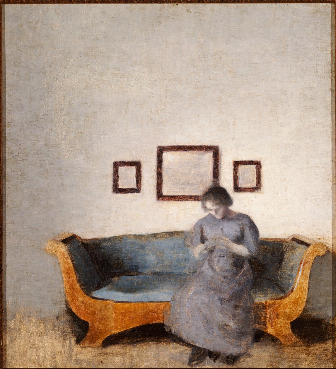 Ida Hammershoi istuu sohvalla tekijältä Vilhelm Hammershoi
