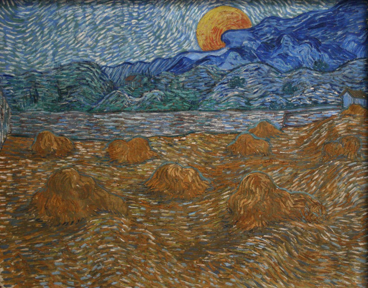 Maisema, jossa on vehnänkorret ja nouseva kuu tekijältä Vincent van Gogh