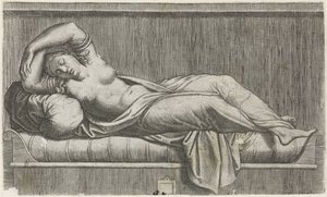 Cleopatra puolialaston makaa sängyllä