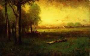 Lehmät laiduntavat auringonlaskun aikaan,