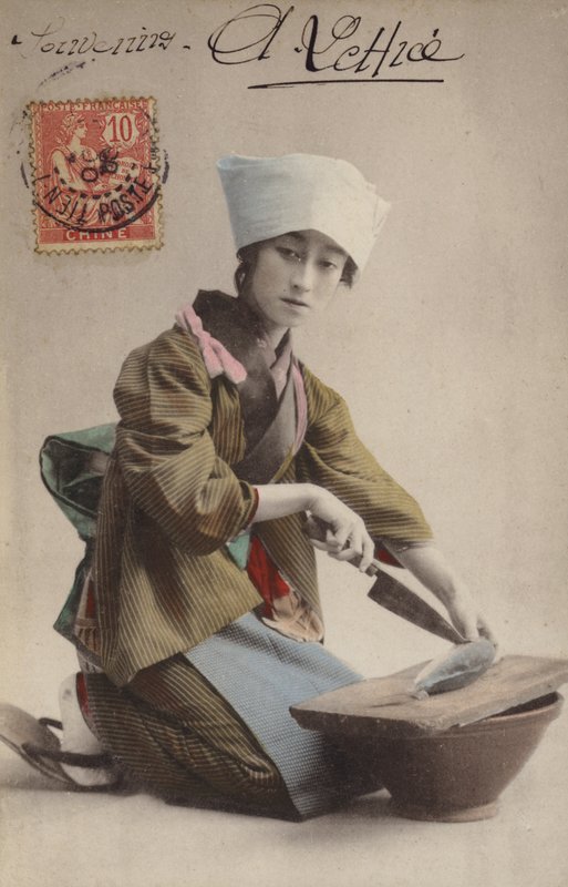 Japanilainen tyttö fileoi kalaa tekijältä French Photographer